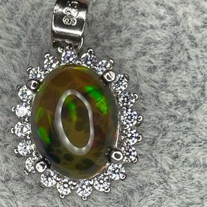 Oval honeycomb Fire Opal, with white sapphire accents